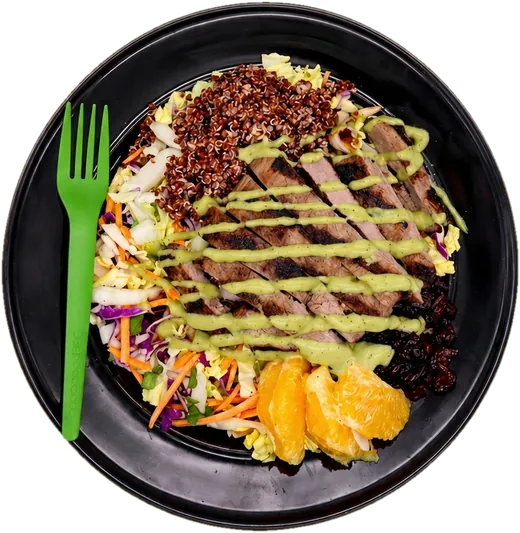 A Fresh Fork Grill salad with grilled steak, red quinoa, cabbage slaw, orange and cranberries
